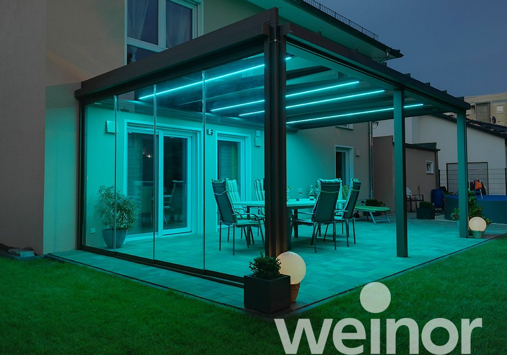 Glass patio roof weinor Terrazza Pure with coloured LED strips