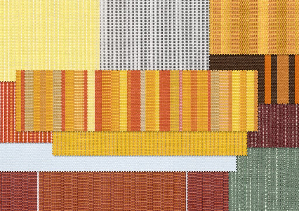 A collage of textured fabric swatches in warm yellow, orange, and brown tones. A collage of textured fabric swatches in warm yellow, orange, and brown tones.