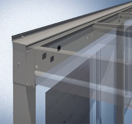 Close-up of a glass sliding wall structure, featuring metallic frames and clear panels.