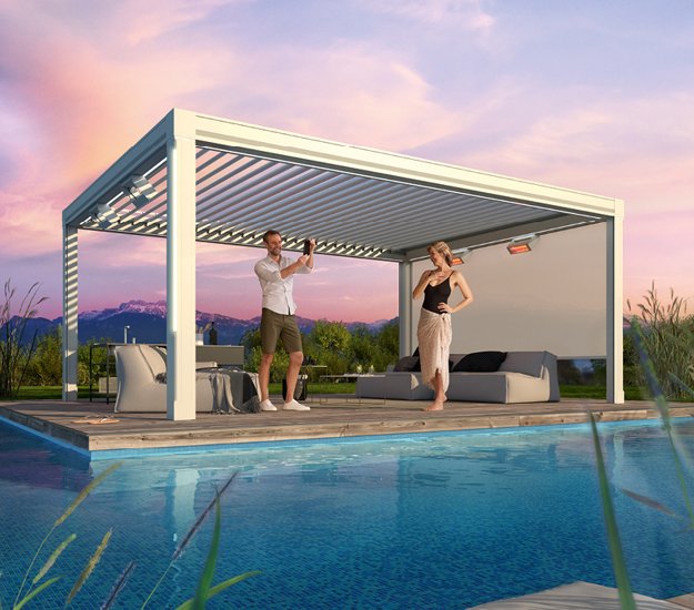 A modern overhang with two people standing on a deck by a pool, surrounded by greenery and a sunset sky. 