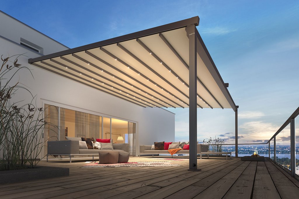 A modern overhang with a slanted roof provides shade over a wooden terrace in a stylish outdoor setting. A modern overhang with a slanted roof provides shade over a wooden terrace in a stylish outdoor setting.