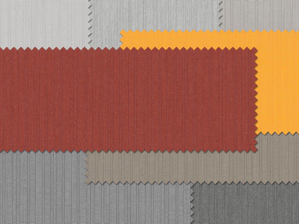 Textile samples in various textures, featuring red, orange, grey, and black patterns. Textile samples in various textures, featuring red, orange, grey, and black patterns.