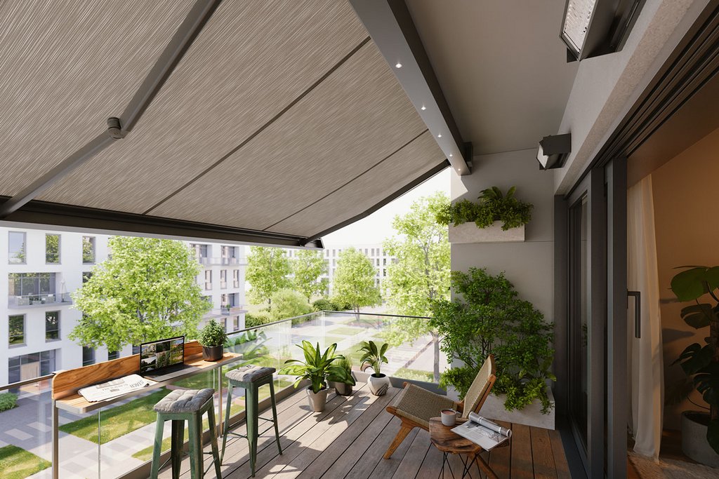 A balcony featuring a large awning, wooden flooring, and potted plants under a clear sky.