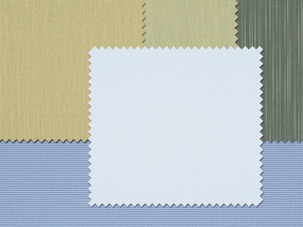 Textiles in various shades including green, yellow, blue, and white with textured patterns.