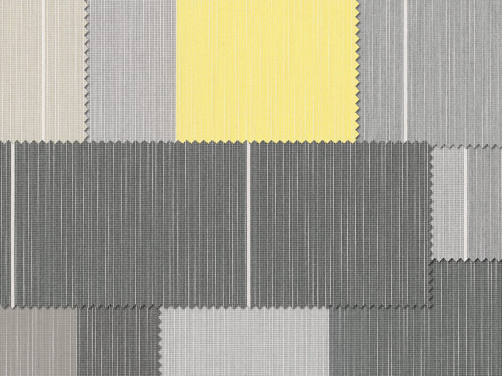 Fabric swatches in various shades of grey with a bright yellow section in the top centre.
