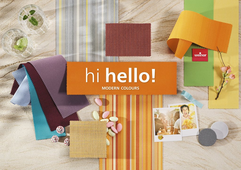 A flat lay of various fabric samples in vibrant colours with a central orange banner saying "hi hello! MODERN COLOURS".