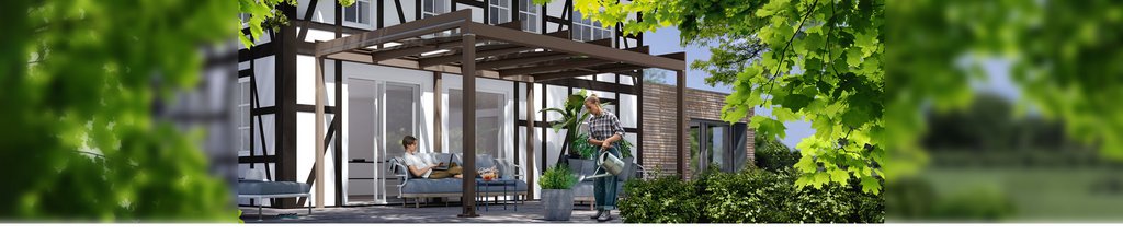 A modern outdoor space featuring a pergola, comfortable seating, and lush greenery.