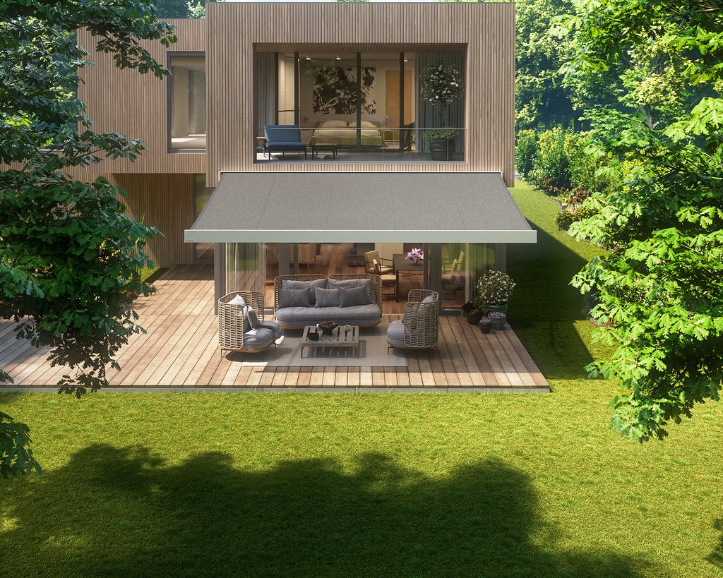 A modern house with a terrace covered by a grey awning, surrounded by greenery. A modern house with a terrace covered by a grey awning, surrounded by greenery.