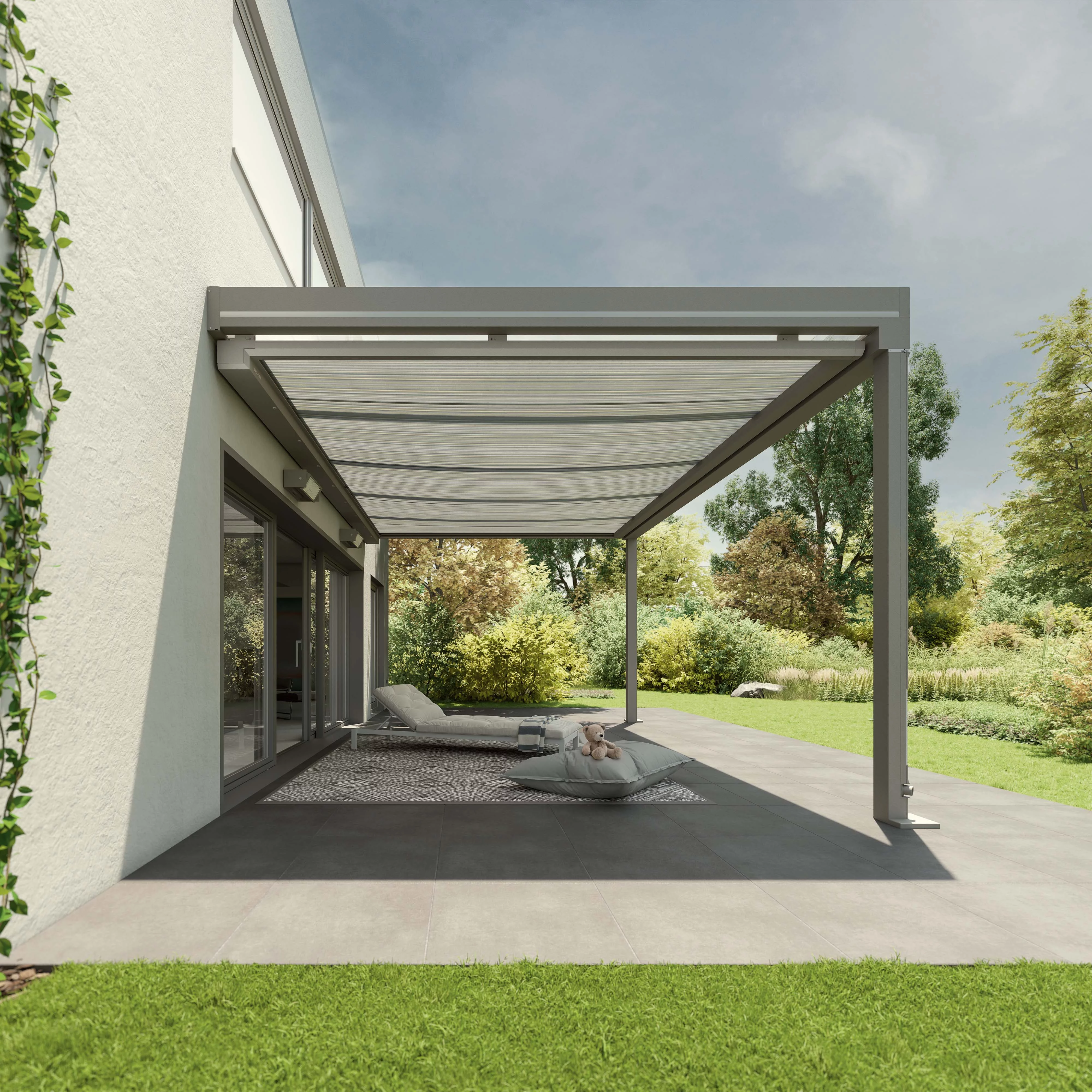 A modern terrace featuring an overhang with a grey frame and a retractable awning above.