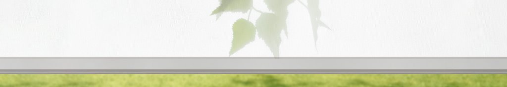 White textured fabric with a hint of green foliage.