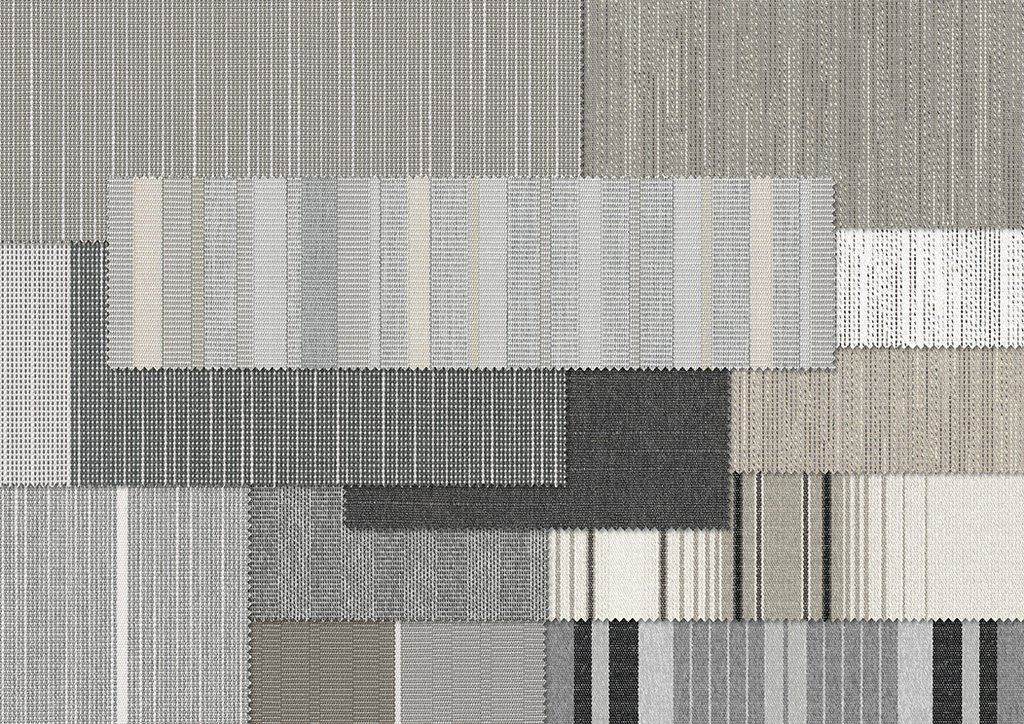 Textile patterns in shades of grey, featuring various textures and stripes.