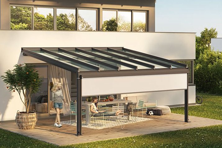 Modern roofing on a house with sliding glass walls and terrace situation in the garden. Modern roofing on a house with sliding glass walls and terrace situation in the garden.