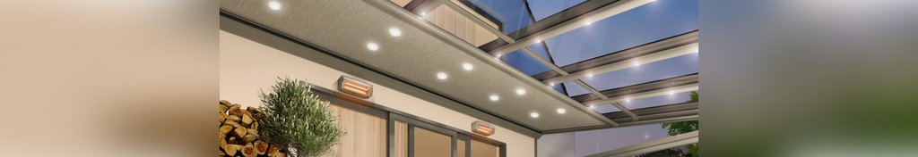 Illuminated terrace with an overhead structure and modern features in a soft colour palette.