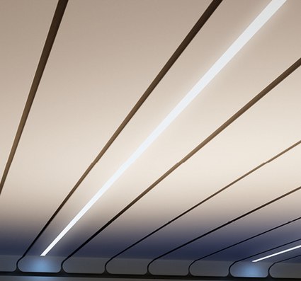 Ceiling with linear patterns and integrated lighting, featuring a gradient of soft white and blue tones.