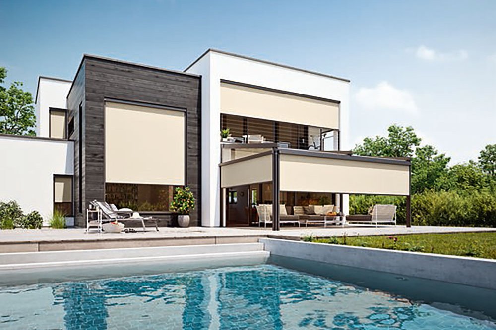 Modern house with shading structures, pool in the foreground, and clear blue sky. Modern house with shading structures, pool in the foreground, and clear blue sky.