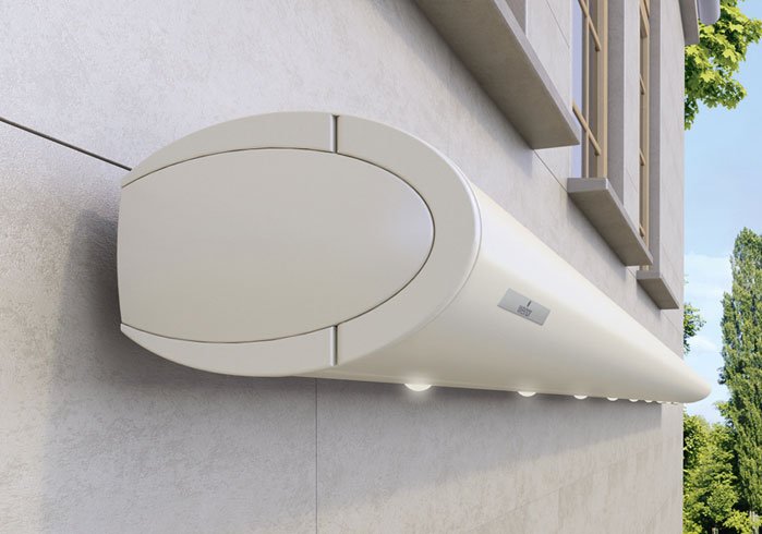 A white, elongated awning box mounted on a wall with a smooth, rounded design.