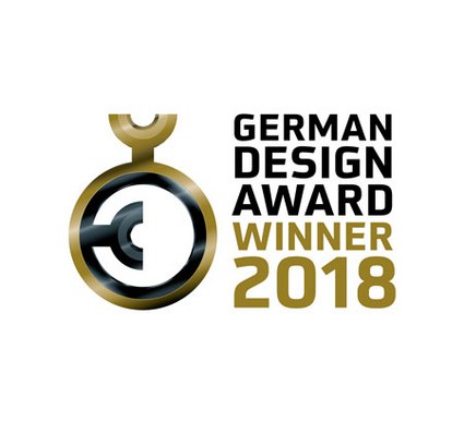 Logo featuring a circular design with gold and black elements, text reading "GERMAN DESIGN AWARD WINNER 2018".